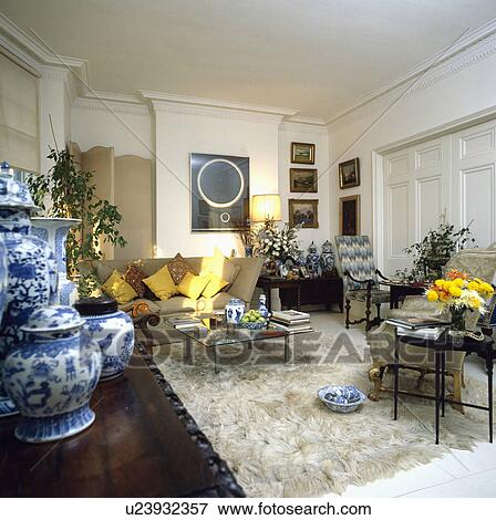 White fur rug in traditional town living room View Large Photo Image Stock Photo - White fur rug in traditional town living room. Fotosearch