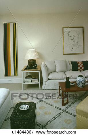 White sofa in modern living room with patterned rug View Large Photo Image Stock Photo - White sofa in modern living room with patterned rug. Fotosearch