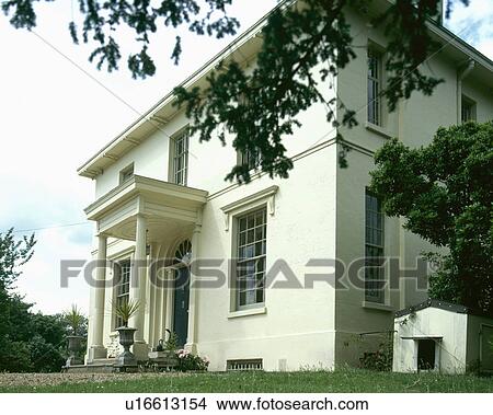 Picture - White Victorian detached house in the country. Fotosearch