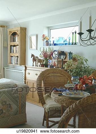 Wicker table and chairs in View Large Photo Image Stock Image - Wicker table and chairs in . Fotosearch