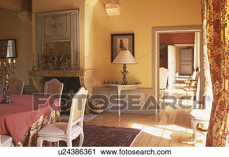 Yellow country diningroom with polished floor and view through doorway to livingroom View Large Photo Image Stock Image - Yellow country diningroom with polished floor and view through doorway to livingroom. Fotosearch