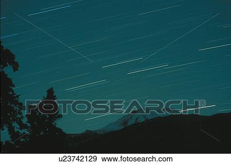 abstract star trails over mountains canadian View Large Photo Image Stock Photo - abstract star trails over mountains canadian. Fotosearch