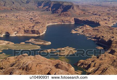Stock Image -  aerial plane lake powell area tan desert . Fotosearch