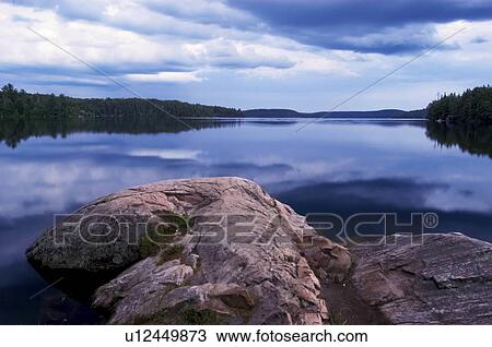 algonquin park canada clouds lake ontario rock View Large Photo Image Stock Image -  algonquin park canada clouds lake ontario rock. Fotosearch