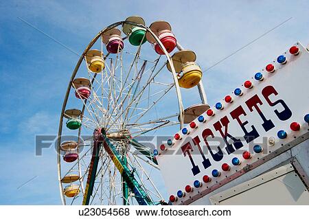 Stock Photo -  amusement park big wheel day fair fairground fun. Fotosearch