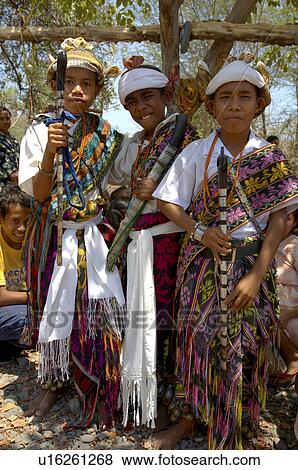 Stock Photo -  art timor leste boys wearing dress including. Fotosearch