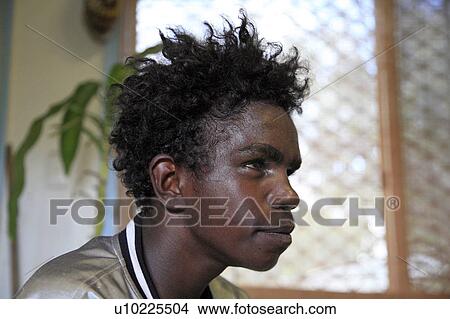 Picture -  australia amos 17 year old boy aborige community. Fotosearch