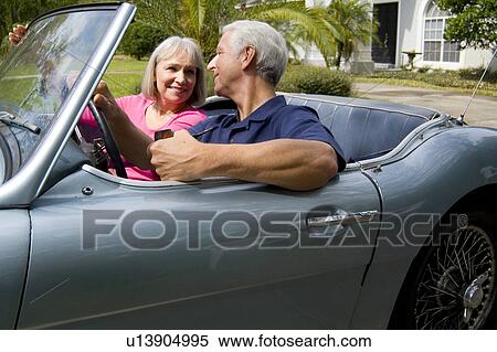 baby car couple sport afflluent boomer in 50s mr View Large Photo Image Stock Photography - baby car couple sport afflluent boomer in 50s mr. Fotosearch
