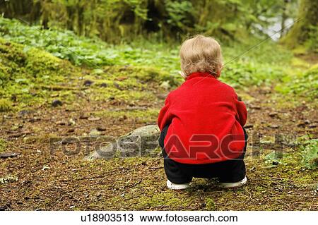 baby girl child kid young squatting forest floor View Large Photo Image Stock Image - baby girl child kid young squatting forest floor . Fotosearch