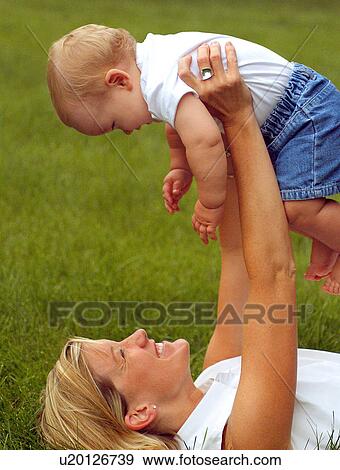 baby love child kid 01 year 30-35 years affection View Large Photo Image Stock Photo - baby love child kid 01 year 30-35 years affection. Fotosearch