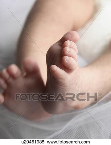 Stock Photography - babys bare feet in moose jaw saskatchewan. Fotosearch