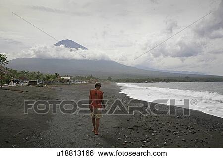 Stock Photograph -  background beach people man person indonesia . Fotosearch