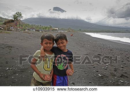 background beach people person indonesia boy se View Large Photo Image Stock Photography - background beach people person indonesia boy se . Fotosearch