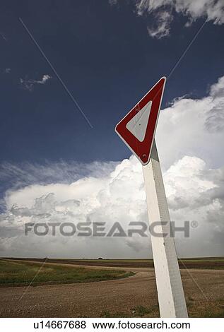 Stock Photo -  background summer yeild sign clouds in storm . Fotosearch