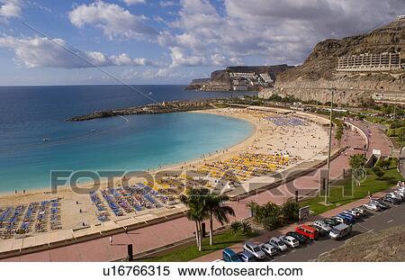 Stock Photography -  beach beautiful scene cove amadores port mogan. Fotosearch