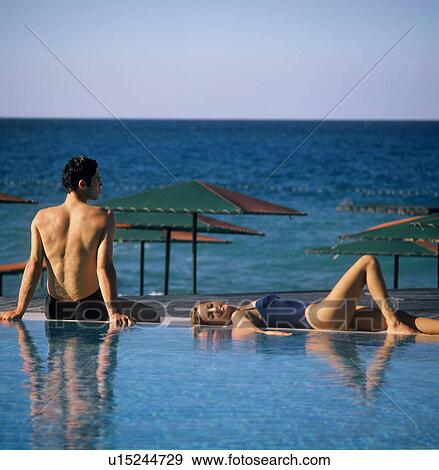 beach couple man 25-30 years brunette calm View Large Photo Image Stock Photo - beach couple man 25-30 years brunette calm. Fotosearch