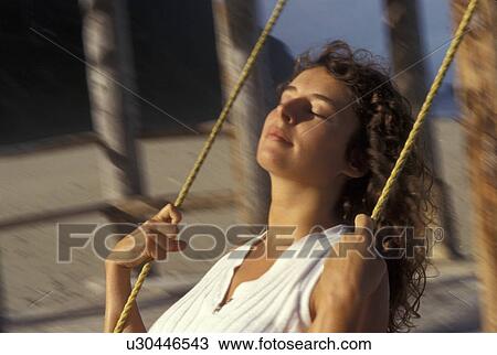 beach fitness model swing in motion released View Large Photo Image Stock Image - beach fitness model swing in motion released . Fotosearch