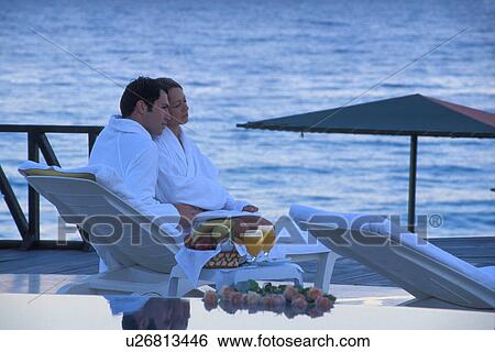 beach love couple man 25-30 years affection deck View Large Photo Image Stock Photograph - beach love couple man 25-30 years affection deck. Fotosearch