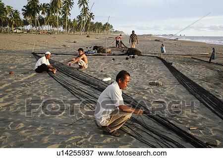 beach people person indonesia fishermen nets View Large Photo Image Stock Photo - beach people person indonesia fishermen nets . Fotosearch