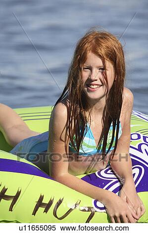 beach water summer girl children redheaded View Large Photo Image Stock Photography - beach water summer girl children redheaded . Fotosearch