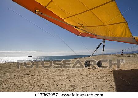 beach water summer hang glider edge cliff view View Large Photo Image Stock Photo - beach water summer hang glider edge cliff view. Fotosearch