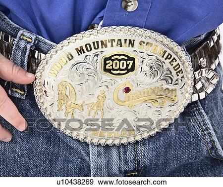 Stock Photo -  big belt buckle small waist portrait moose jaw. Fotosearch