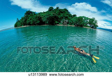 Stock Photo -  bikini nature adult adventure bliss blissful day. Fotosearch