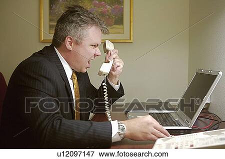 business computer yelling phone mr angry stress View Large Photo Image Stock Photo - business computer yelling phone mr angry stress. Fotosearch