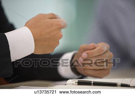 Stock Image -  business people hand meeting gestures belgium . Fotosearch