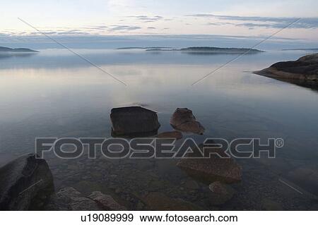 calm superior sunrise rossport ontario canada View Large Photo Image Stock Photo - calm superior sunrise rossport ontario canada. Fotosearch