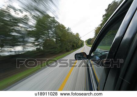 car travel fast driving speed velocity act View Large Photo Image Stock Photo - car travel fast driving speed velocity act. Fotosearch