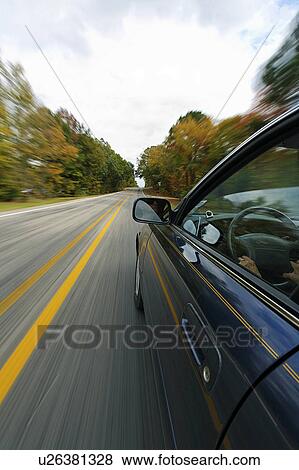car travel fast driving speed velocity act View Large Photo Image Stock Photo - car travel fast driving speed velocity act. Fotosearch