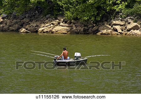 Stock Photograph -  cat boat boating fun lifestyle lake fishing day. Fotosearch