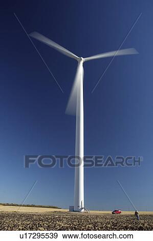 Stock Photo -  checking out wind turbine st leon manitoba power. Fotosearch