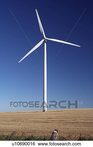 Stock Photograph -  checking out wind turbine st leon manitoba power. Fotosearch