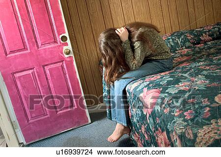 Picture -  child 10-12 years 13-15 adolescent anxiety bed. Fotosearch