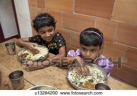 child children india mealtime mary matha bala View Large Photo Image Stock Image - child children india mealtime mary matha bala . Fotosearch
