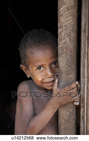 Stock Photo -  child face children timor leste boy aosera east. Fotosearch
