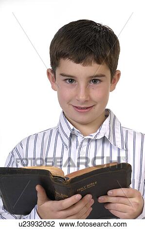 Stock Image -  child face children young boy bible 1 adolescent. Fotosearch