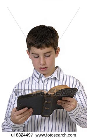 Stock Photo -  child face children young boy bible 1 adolescent. Fotosearch