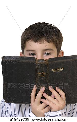 Stock Photo -  child face children young boy bible 1 adolescent. Fotosearch