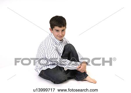 Stock Photo -  child face children young boy in studio 1 alone. Fotosearch