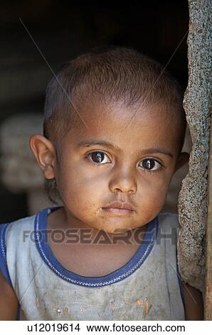 Picture -  child face kid timor leste aileu east asia south. Fotosearch