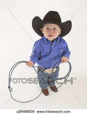 children young calf roper small cowboy liarat View Large Photo Image Picture - children young calf roper small cowboy liarat . Fotosearch