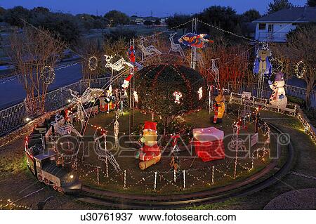Stock Photo -  christmas richardson texas lights mr occhiuzzos. Fotosearch