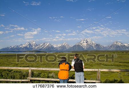 couple beauty enjoying beautiful grand tetons View Large Photo Image Stock Photograph - couple beauty enjoying beautiful grand tetons . Fotosearch