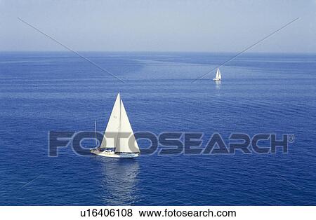 couple two white sailboats deep blue sea istria View Large Photo Image Stock Photo - couple two white sailboats deep blue sea istria. Fotosearch