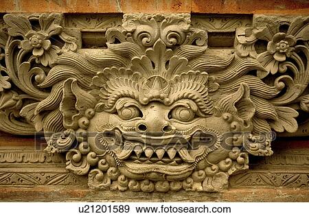 Stock Photo -  design face art balinese stone bali indonesia. Fotosearch