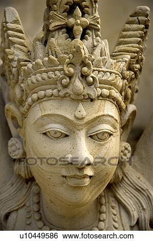 Stock Photograph -  design face art balinese stone bali indonesia. Fotosearch