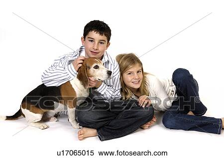 Stock Photography -  dog girl child face children boy pet beagle . Fotosearch